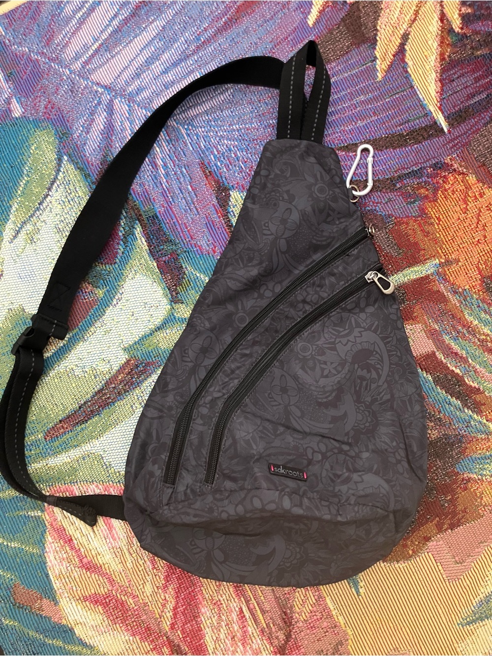 Sakroots Sling Backpack – shoulder Crossbody bag with multiple zipper pockets